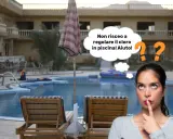 Ragazza pensierosa vicino a una piscina, preoccupata per i valori cloro piscina.