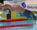 Paul Biedermann in gara, immerso nell'acqua con braccia protese.